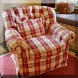 F36. Plaid swivel chair. 35”h x 38”w x 40”d 